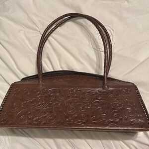 Shazel hand tooled leather purse with beautiful handle.